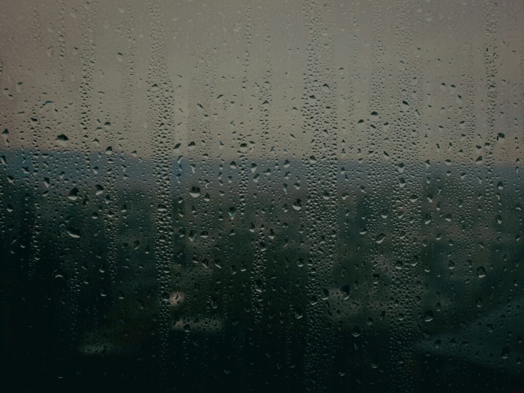 a window with rain drops on it